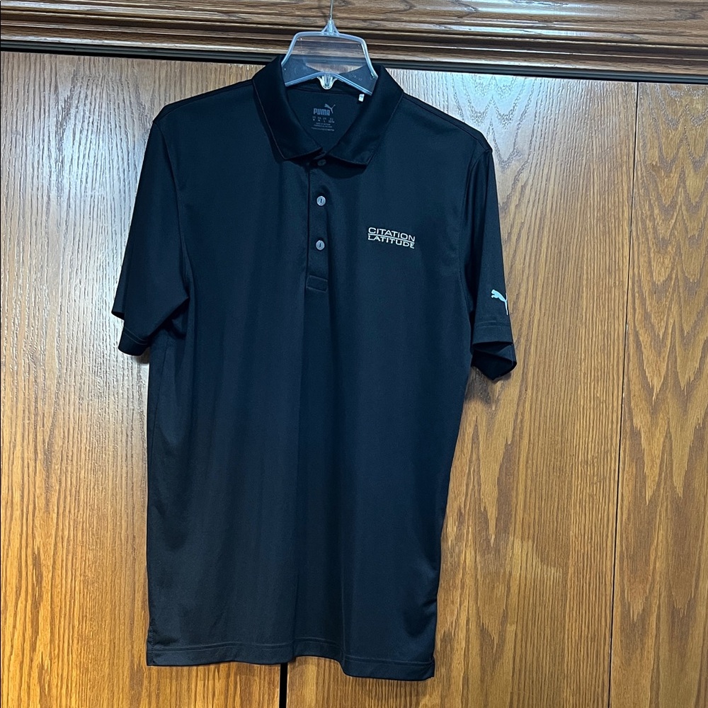 Puma (BRANDED)  Citation Latitude.  Size M.
